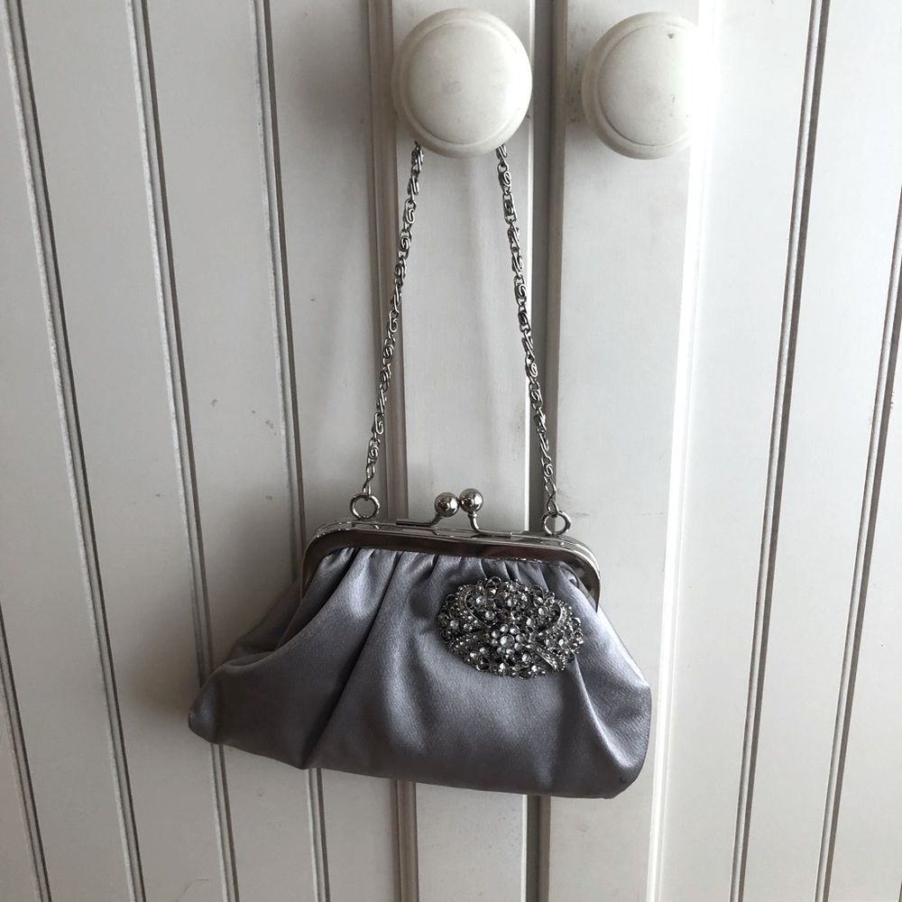 Pretty little silver purse by CLAIRE’S